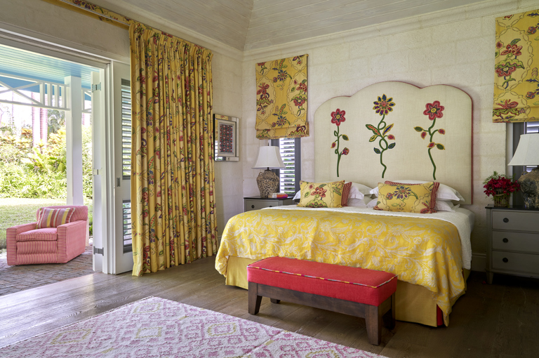A diagonal image focusing on the bed, in bedroom 5. At Rossferry, the Carribean Property managed by Firmdale Hotels. 