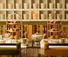 An image of the table and full afternoon tea set up at The Potting Shed, Dorset Square Hotel.