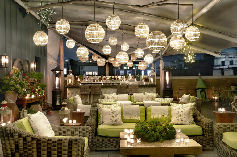 Night wide shot of the Roof Terrace at Ham Yard Hotel
