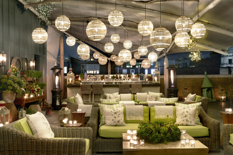 Night wide shot of the Roof Terrace at Ham Yard Hotel