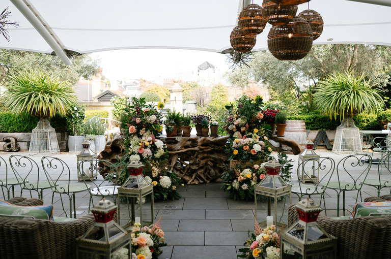 The roof terrace at Ham Yard Hotel is set up for an outdoor wedding