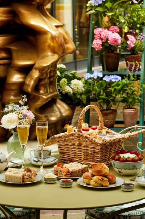 The Wimbledon themed afternoon tea available at Ham Yard Hotel alongside Ham Yard Centre Courtyard running throughout Wimbledon.