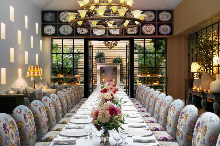 Close shot of long dining tables set-up in the Orangery private events room at the Whitby Hotel