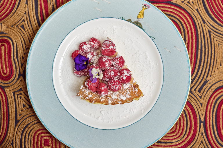 A slice of berry tart on a plate at The Whitby Bar