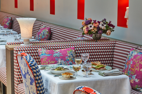 An image of the lunch set up in The Warren Street Hotel, on the table we see multiple dishes from the A La Carte menu.