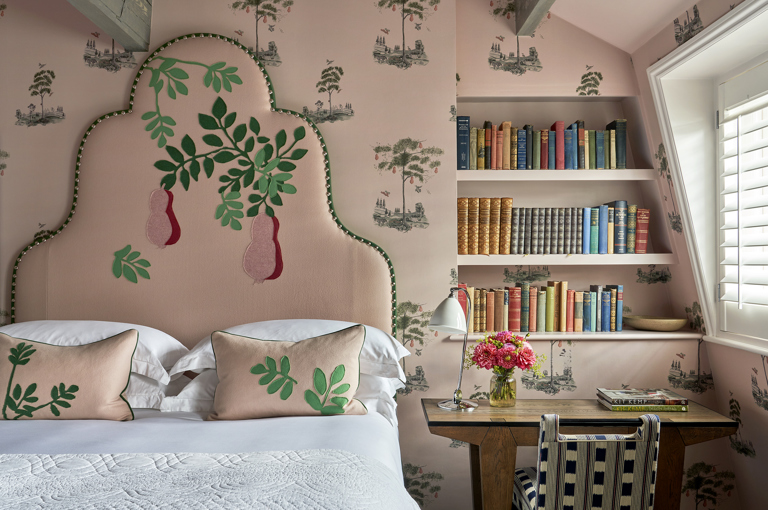 A front on shot of a king size bed in room 303, a Luxury Room at Number Sixteen