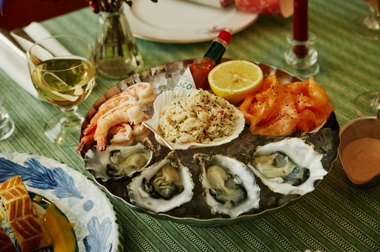 A close up image of the seafood platter of oysters, prawns, smoked salmon and dressed crab to promote the Refuel, Christmas Eve menu at Soho Hotel.