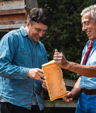 Head Chef Joe Fox with Bermondsey Street Bees Founder Dale Gibson examining a piece of honeycomb