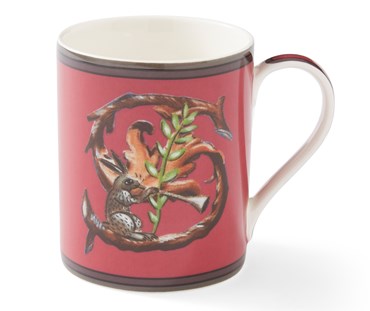 The "S" on this red mug forms an entwined branch , and a perfect point for our, trumpet carrying hare to herald the morning's news.