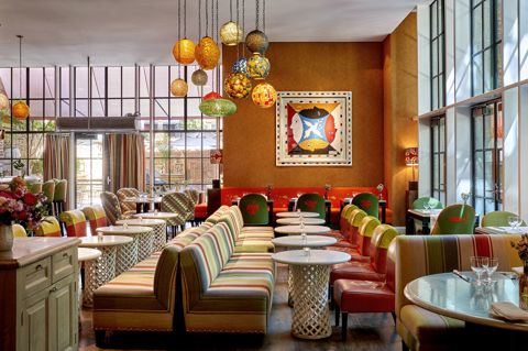 Wide shot of bar tables at Crosby Street Hotel