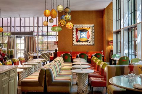 Wide shot of bar tables at Crosby Street Hotel