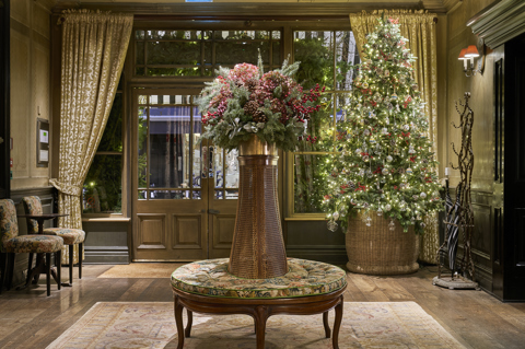 Wide shot of the Christmas Tree and decorations in the lobby at Covent Garden Hotel