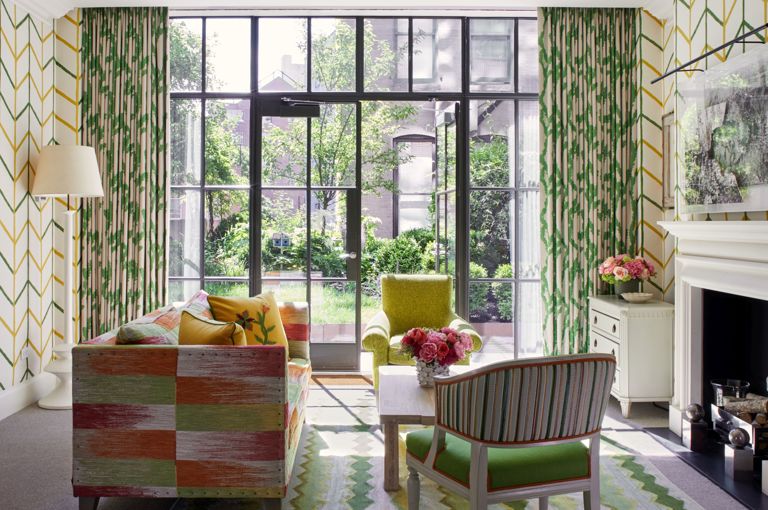 Side living room shot of the Meadow Suite at Crosby Street Hotel