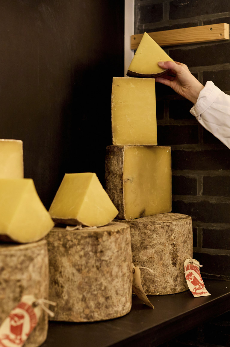 Close up portrait shot of blocks of cheese at Neal's Yard Dairy 