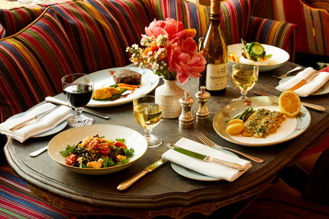 A zoomed in image of multiple seasonal dishes on the table, at the Whitby Bar.