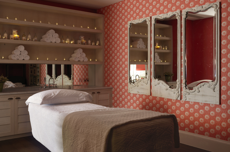 Diagonal shot of a single treatment room of the Soholistic Spa at Ham Yard Hotel