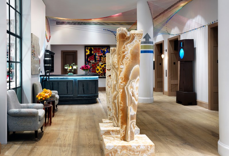 The sculpture and art filled lobby at The Whitby Hotel, New York