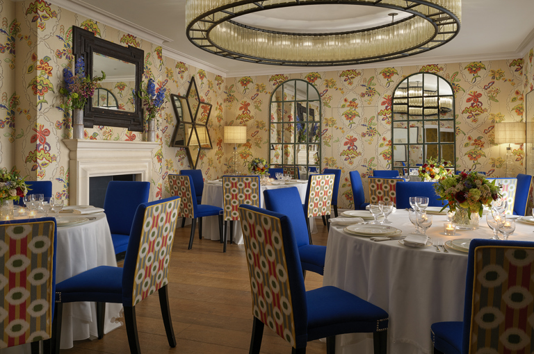 Round dining tables set-up in the Fortune private events room at Covent Garden Hotel
