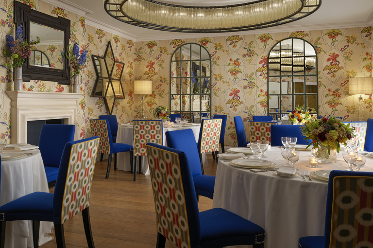 Round dining tables set-up in the Fortune private events room at Covent Garden Hotel