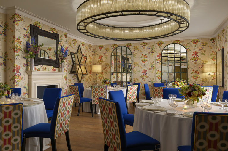 Round dining tables set-up in the Fortune private events room at Covent Garden Hotel