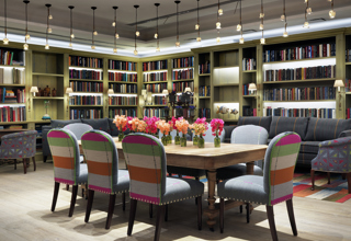 Diagonal shot of lounge and table area in the Reading private events room at the Whitby Hotel