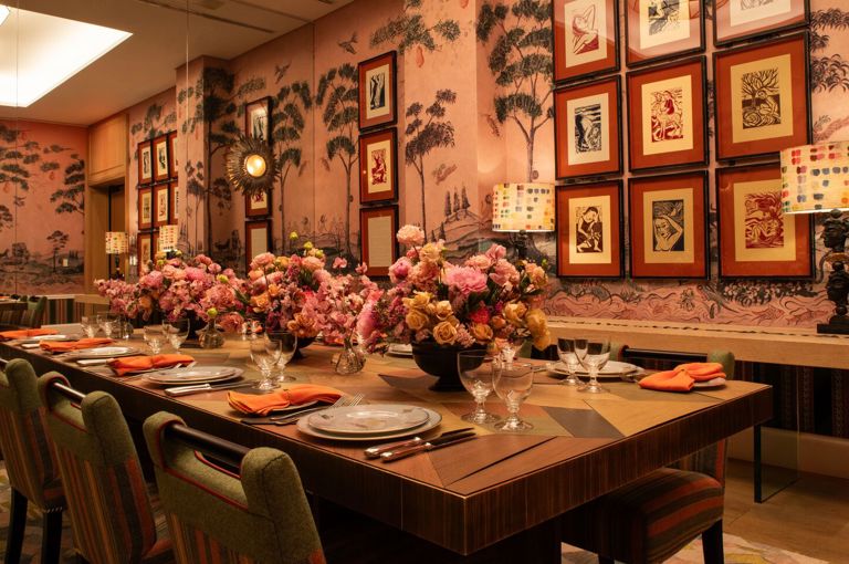 Diagonal shot of a long dining table set-up in the Araminta private events room at the Whitby Hotel