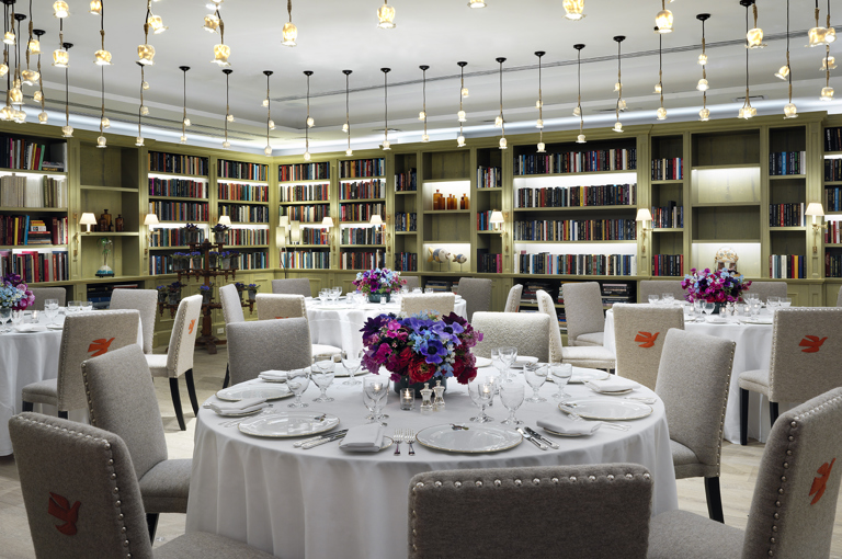Round dining tables set-up in the Reading private events room at the Whitby Hotel