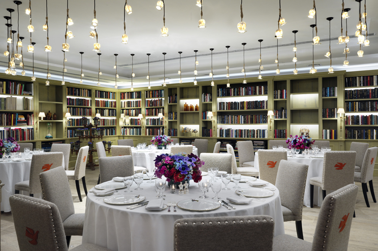 Round dining tables set-up in the Reading private events room at the Whitby Hotel