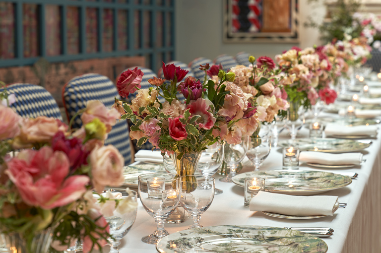 Close shot of a long dining table set-up in the Orangery private events room at Warren Street Hotel