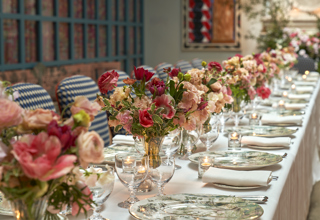 Close shot of a long dining table set-up in the Orangery private events room at Warren Street Hotel