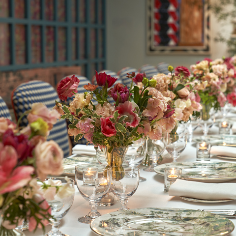 Close shot of a long dining table set-up in the Orangery private events room at Warren Street Hotel