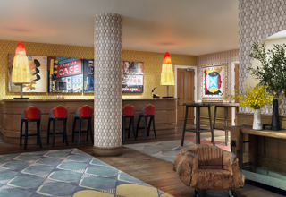 Wide shot of the reception bar in the private events lobby at Crosby Street Hotel