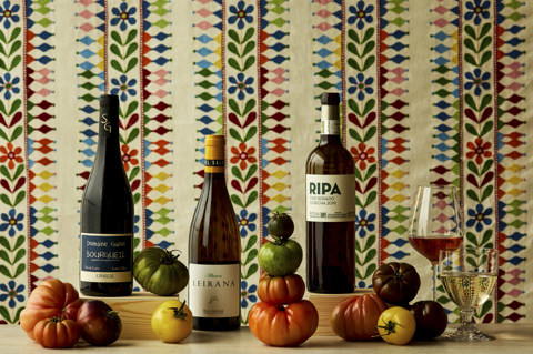 Wide shot of tomatoes and wine